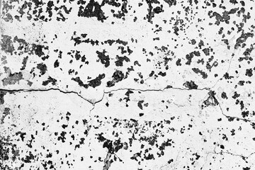 Texture of a concrete wall with cracks and scratches which can be used as a background