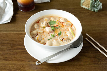 Spicy tom kha soup made with mushrooms and coconut milk.