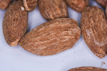 Dried almons in porcelain bowl