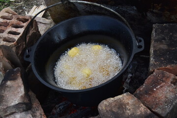 potatoes in a cast iron kettle