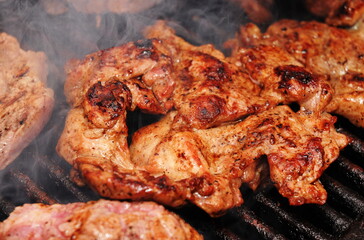Grilling  steaks on barbecue grill
