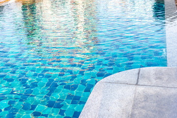 Obraz premium Wave Water in swimming pool. Blue ripped water in pubic swimming pool.