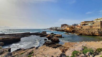 Waves crashing on rocks. Salt production. Discover the world. Heavy wind at the beach. Place to relax and enjoy tanning. Vacations in Lebanon. Fun day