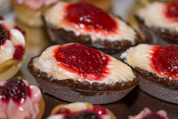  cream cakes with  fruit 