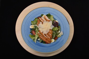 salad with tomatoes, smoked ham,cheese and mayonnaise