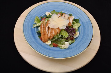 salad with tomatoes, smoked ham,cheese and mayonnaise