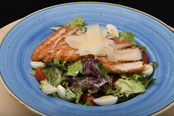 salad with tomatoes, smoked ham,cheese and mayonnaise