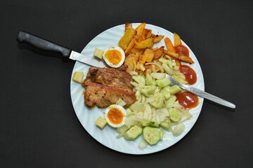Traditional romanian food ,potato salad with barbecue 