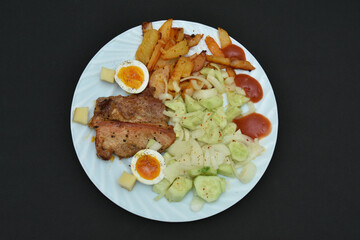 Traditional romanian food ,potato salad with barbecue 