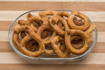 Pretzels crackers bagels  with wine,crispy goodies with lemon and pepper