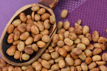 Soya beans over white background.