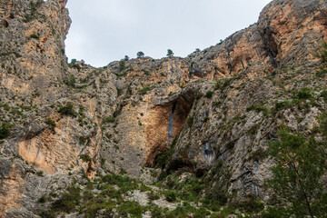 Mountains landscape with picturesque rocky walls, in Barranc del Cinc, in Alcoy, Alicante 