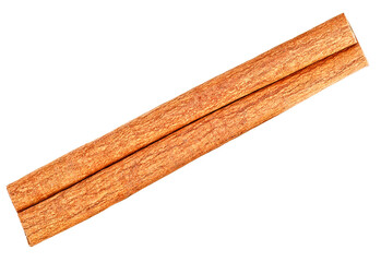 Aromatic cinnamon stick isolated on a white background, top view. Fragrant cinnamon bark.