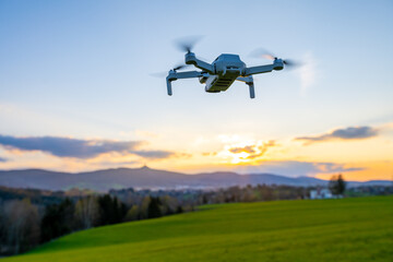 Drone silhouette at sunset time