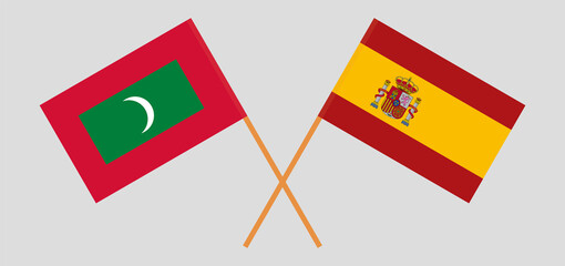 Crossed flags of Maldives and Spain. Official colors. Correct proportion