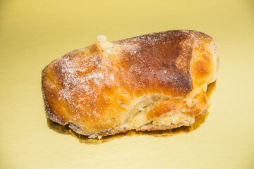Breakfast,romanian homemade crullers, branzoici on a black tray