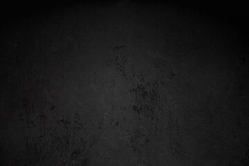 Black concrete wall wide texture, dark background
