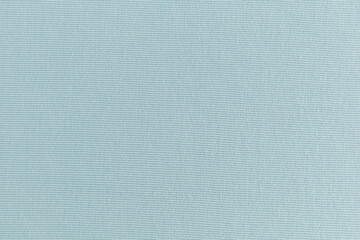 smooth surface of soft knitted fabric for sewing clothes in turquoise color, background, texture