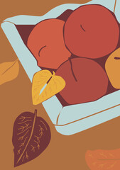 Autumn leaves and fruit apple basket on the brown isolated background. Fall mood.