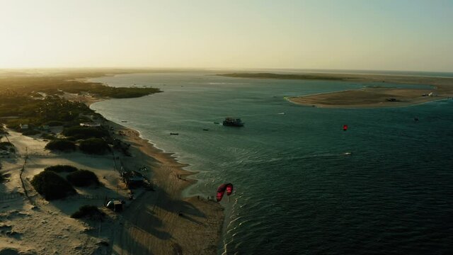 lagoon sunset brazil atins aerial overview panorama water sports kitesurfer kite camp golden hour travel summer 4k