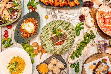Set of typical Spanish dishes top view