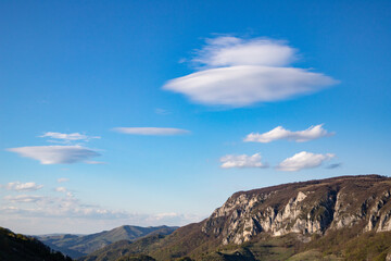 flying saucer shaped white cloud