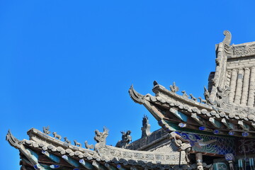 Fototapeta na wymiar Reconstructed roofs-buildings in the restored Ming Qing food street. Zhangye-Gansu-China-1313