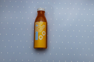 open boxes with sushi rolls and a bottle of fresh juice, food delivery packaging made of eco-friendly materials, beautiful disposable tableware in bright colors