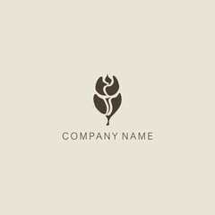 A symbol or logo of a simple, minimalistic, stylized bud and leaves tulip shape, composed of several elements. Made with a spot