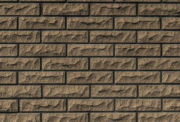 Gray brown and black brick wall background	