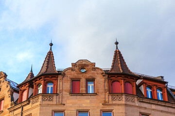 Top of old house with attics and spire . Residential house in Bavaria Germany 
