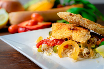 Healthy foods, full of vegetables and delicious flavors presented in white plate with colorful background