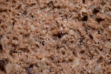 Rye black bread texture macro detailed shot
