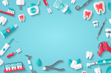 Teeth and dentist tools on blue background