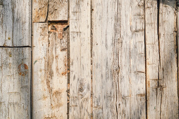 Antique reclaimed wood background with aged boards lined up. Wooden floor planks with grain and texture.