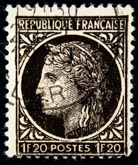 stamp printed in france shows marianne - a french national symbol