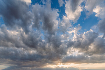 Amazing cloudscape on the sky at sunset time.
