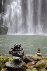 Stone stack in front of the waterfall 1