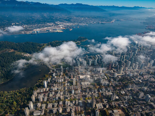 Obraz premium Stock aerial photo of scattered clouds over downtown Vancouver, Canada