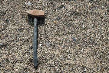 Large sledgehammer for crushing lies on small pebbles