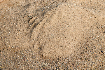 A pile of sand. Natural sand texture close-up as background