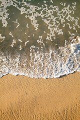 wave and sand on the beach 