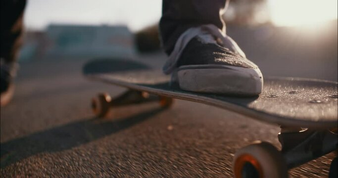 detail of foot skating on a skateboard