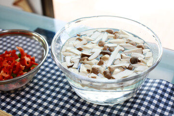 Slice of mushroom soaked in water preparing for food cooking, home living lifestyle, herb vegetable for healthly food cooking