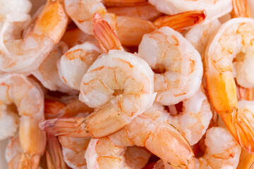 Fresh raw prawns on white background.