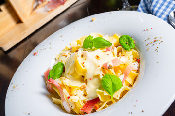 Tagliatelle with gorgonzola masarpone sauce and ham.