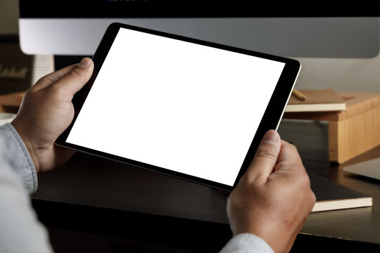 man holding blank screen tablet design  Close up of ipad.mock up tablet computer