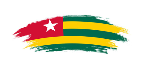 Artistic grunge brush flag of Togo isolated on white background