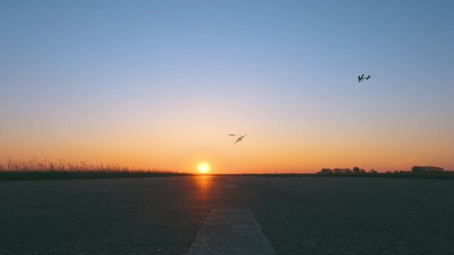 The testing flights on the beautiful sunset background