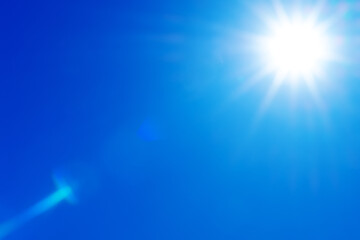 Fototapeta premium Natural background of sky and bright sun with soft effect. sky background in soft colors with rays and highlights